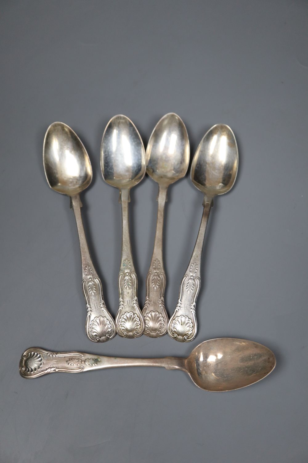 A set of five Victorian silver kings pattern teaspoons, monogrammed W, James McKay, Edinburgh, 1853/4, 3 oz (a.f.).